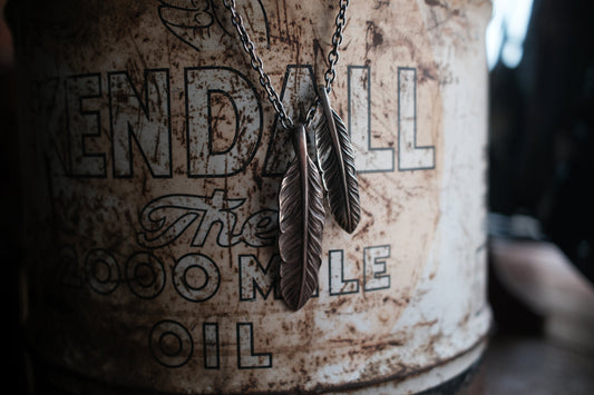 "Lynch Silversmith" Feather